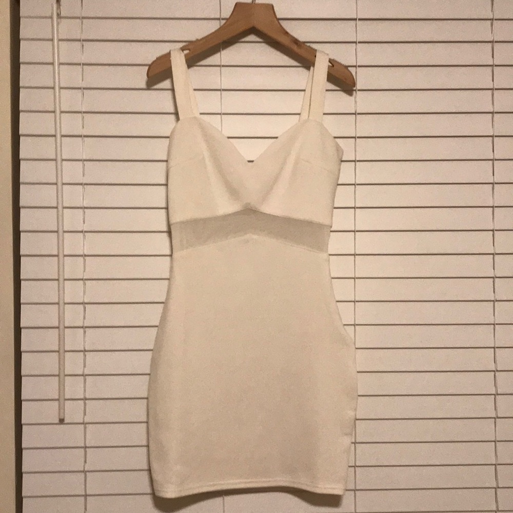White cut out (with mesh) mini dress from Tobi.